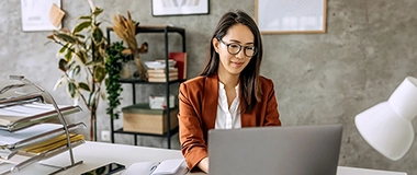 Two employees talking in the office