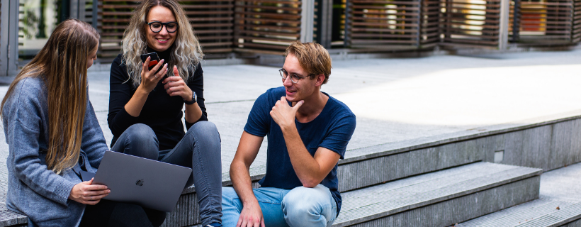 a group of young professionals talking 