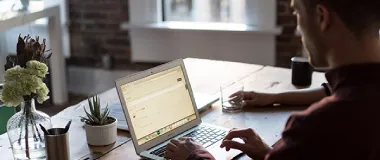 A man working from home on his laptop