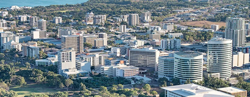 A bunch of apartments in a line on a sunny day in Darwin