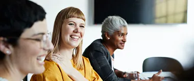 A meeting in the office with three managers