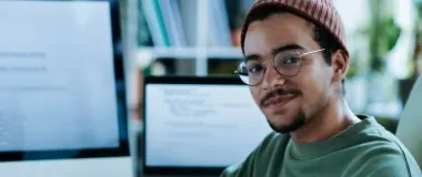 Man in stripped shirt and glasses 