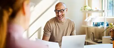 a woman working on her computer