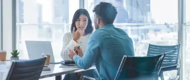 two colleagues in a meeting