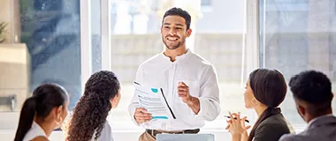 man teaching a group