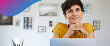 Lady in yellow shirt at laptop