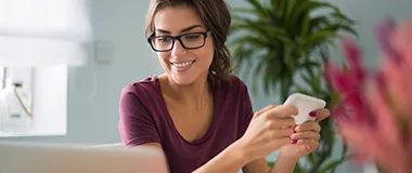 Woman reading Hays newslettter