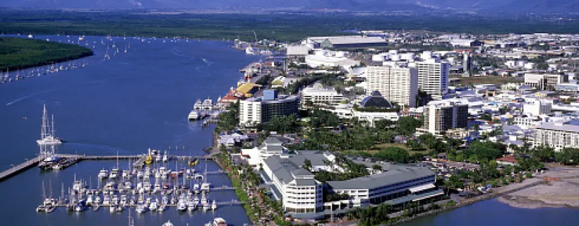 A city near the water on a sunny day in regional Queensland