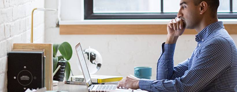 A man working at his desk in the office