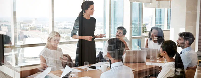 a group of coworkers in a meeting