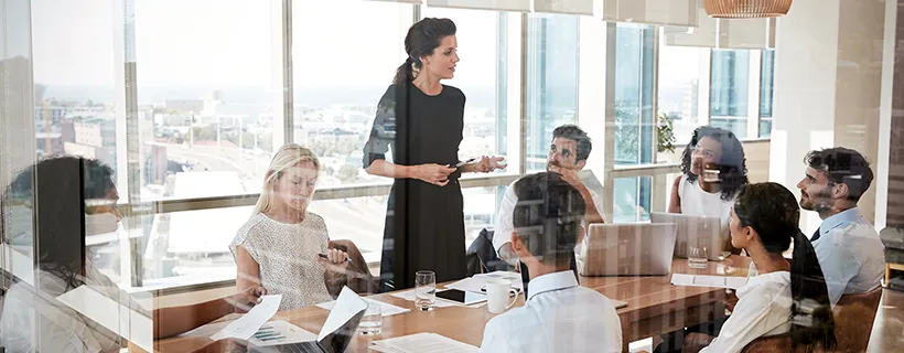 a procurement team meeting in the office