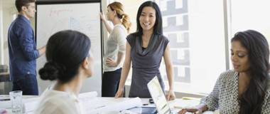 Employees having a meeting in the office