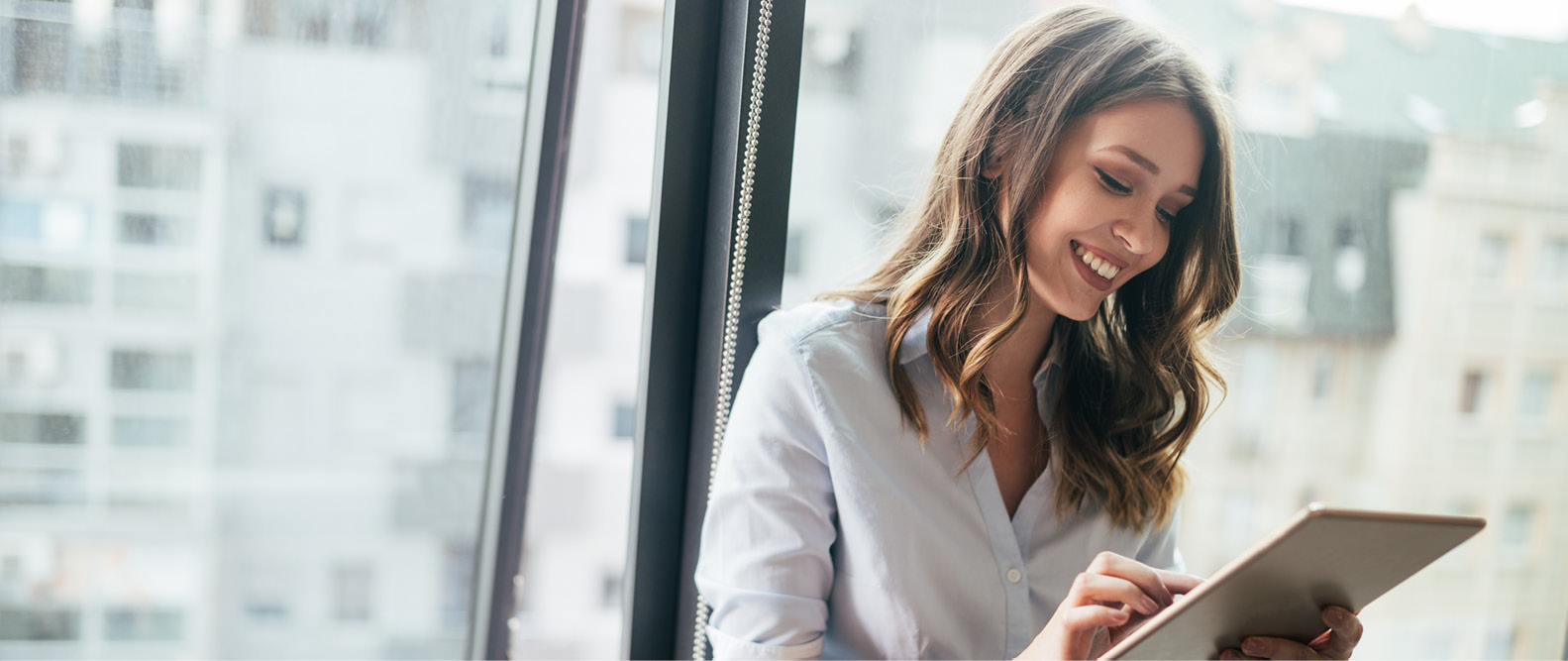 a girl working and smiling