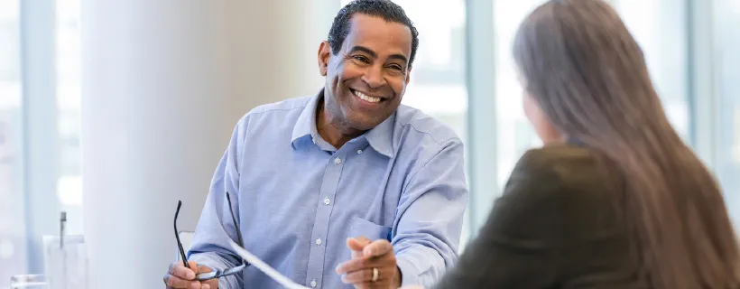 two colleagues in a meeting