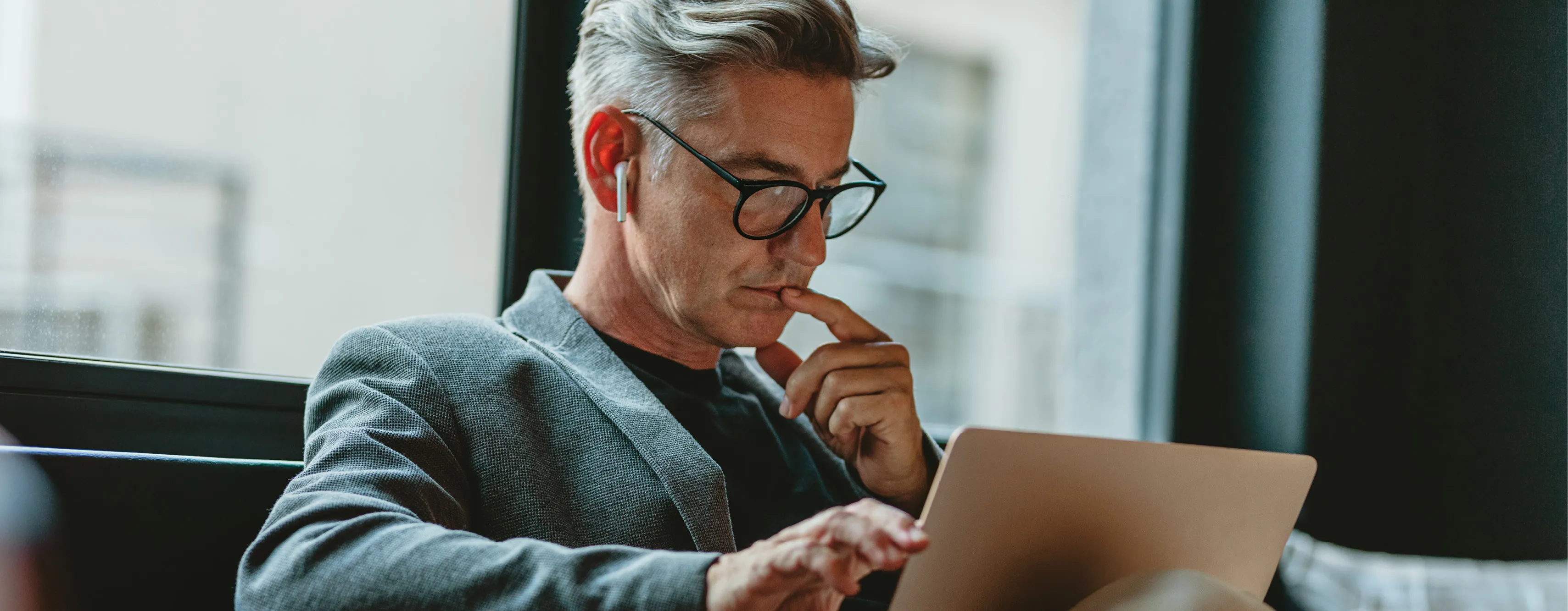 a male working on his ipad