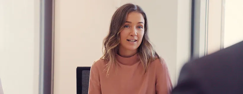 A woman being interviewed for a new position