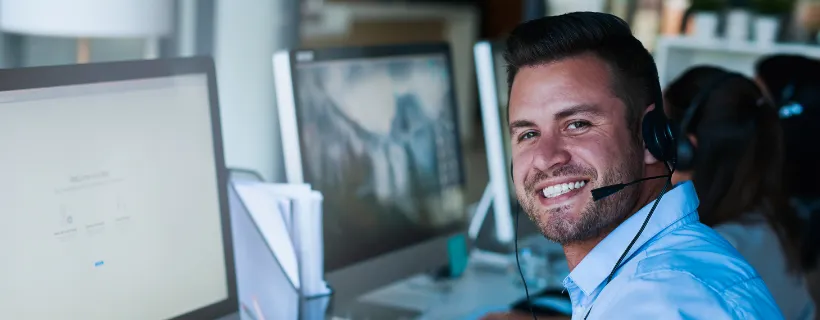 a male working in office support