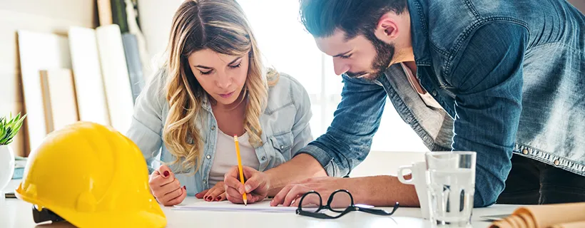 Man and woman showing the role of an architect