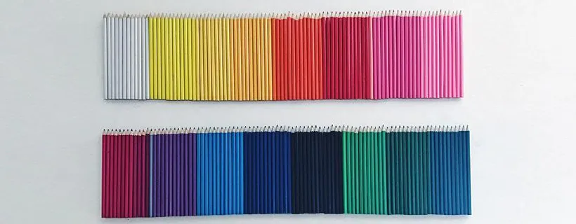 Coloured pencils organised in a colour coordinated fashion