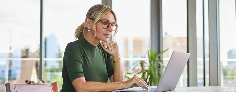 A woman working at her desk in the office