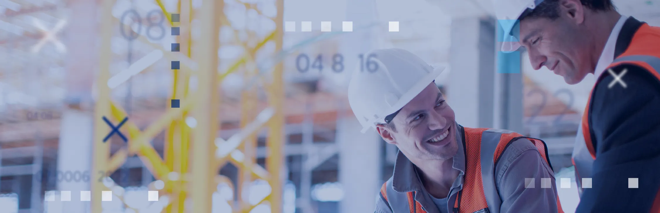 two men in construction smiling 