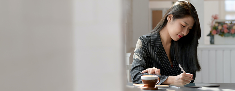 A woman working in a cafe